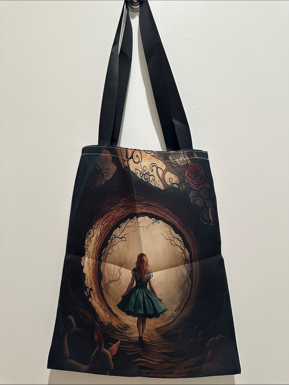 Illustrated Alice in Wonderland Tunnel Print Tote Bag in Black